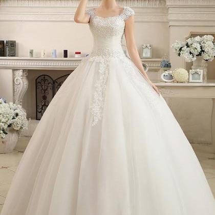 W3558 Cap Sleeve Appliques Beaded Ball Gown..